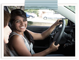 Teenage girl learning to drive