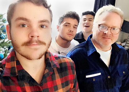 Steve Combs and three teens he has fostered or adopted.
